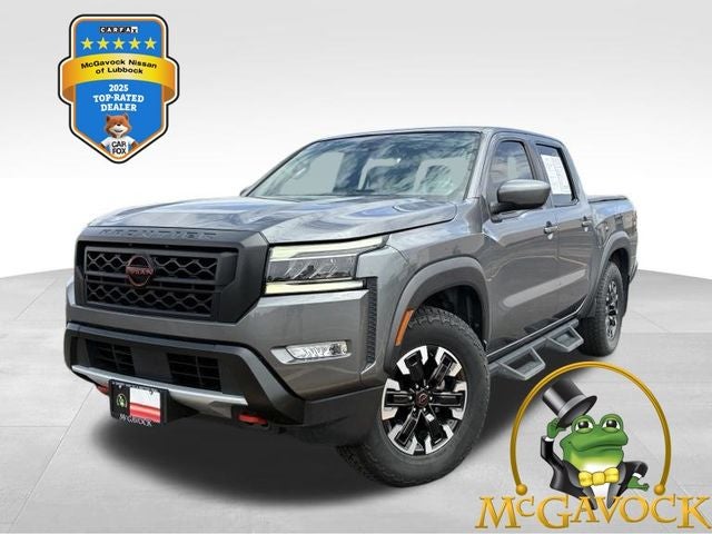 2023 Nissan Frontier PRO-X in Gun Metallic — front three-quarter view