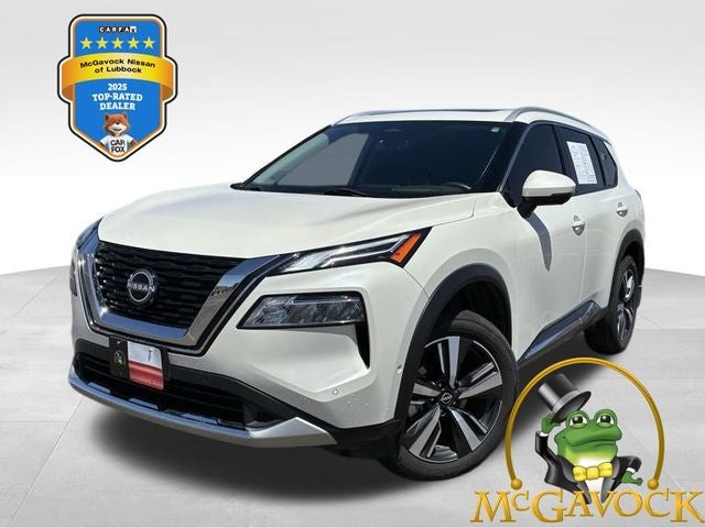 2023 Nissan Rogue Platinum in Pearl White Tricoat — front three-quarter view