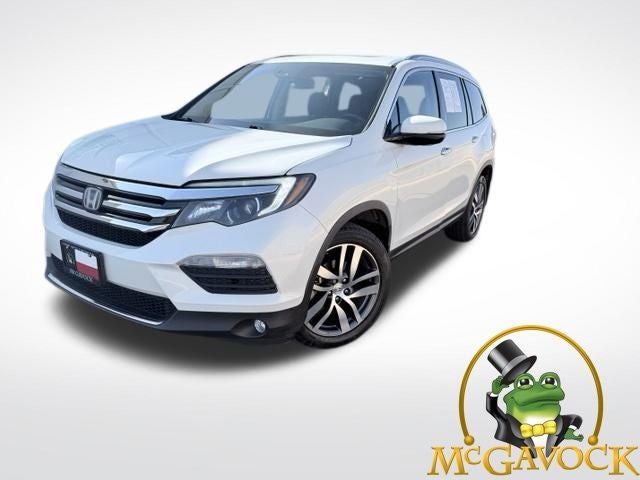 2016 Honda Pilot Elite in White Diamond Pearl — front three-quarter view
