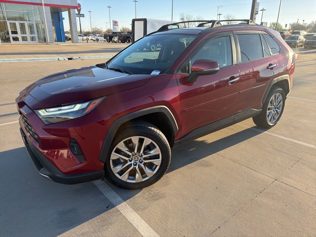 2022 Toyota RAV4 Limited in Ruby Flare Pearl — front three-quarter view