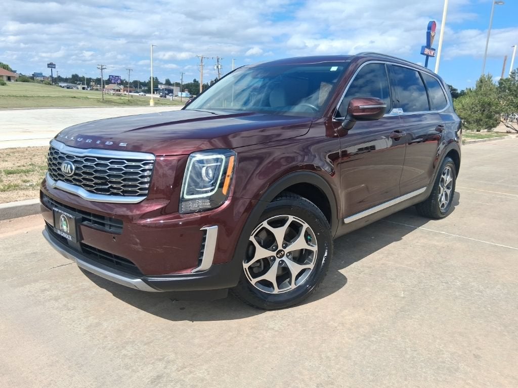 2021 Kia Telluride EX in Sangria — front three-quarter view